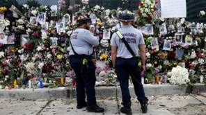 Memorial por las víctimas del derrumbe en Miami.